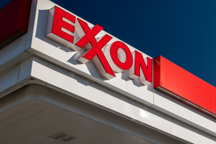 Exxon Mobil has sent layoff warnings to 59 employees as part of its personnel restructure following the $60 billion acquisition.